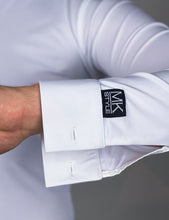 It is a great idea to have white and black dance shirts, you can change your looks easily and create two different characters with one suit. By wearing a white shirt you would create a more classical, sophisticated look, and with black more dapper and stylish.