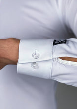 It is a great idea to have white and black dance shirts, you can change your looks easily and create two different characters with one suit. By wearing a white shirt you would create a more classical, sophisticated look, and with black more dapper and stylish.