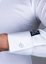 It is a great idea to have white and black dance shirts, you can change your looks easily and create two different characters with one suit. By wearing a white shirt you would create a more classical, sophisticated look, and with black more dapper and stylish.