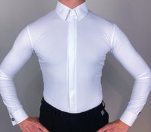 It is a great idea to have white and black dance shirts, you can change your looks easily and create two different characters with one suit. By wearing a white shirt you would create a more classical, sophisticated look, and with black more dapper and stylish.