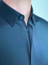 Front hidden zipper allows creating a clean look with no buttons popping out when you want to wear a bow tie